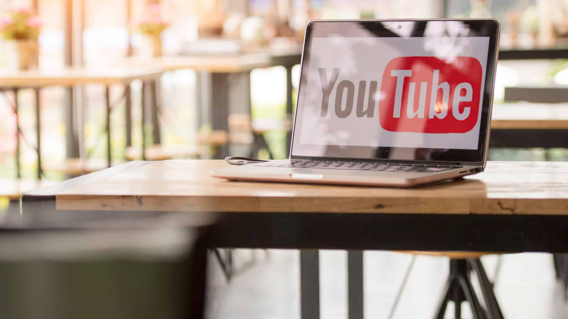 How to pause YouTube videos dynamically with JS without swapping out the URL